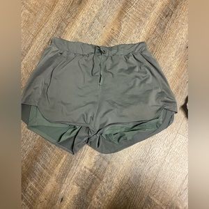 Green athletic shorts size medium